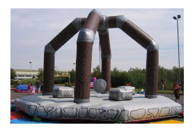 Human Demolition Wrecking Ball Inflatable for hire. Medieval themed inflatable game