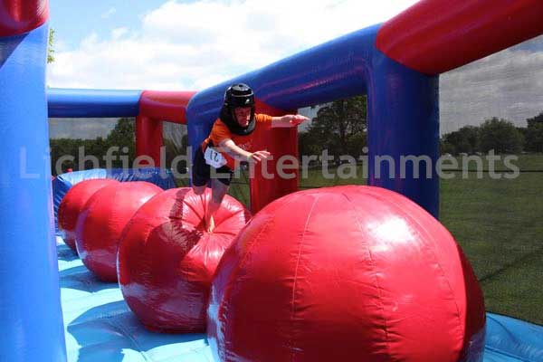 Big Jumping Balls inflatable obstacle course for hire.