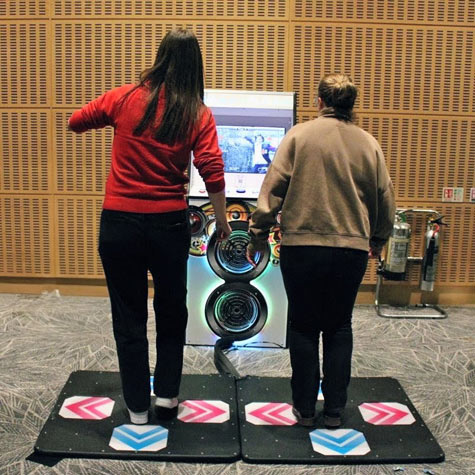 Our Dance Mats arcade game entertaining guests at a St Georges Park Hilton Hotel event we supplied