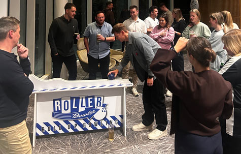 Our Roller Bowler game pulling a large crowd at a St Georges Park Hilton Hotel event we supplied