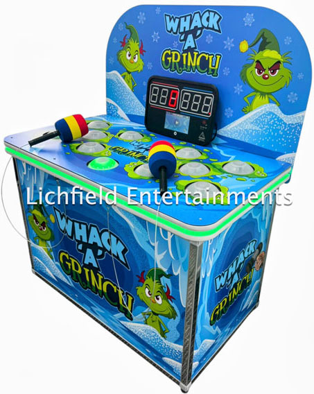 Christmas Grinch themed Whack a Mole game for hire for your Christmas party from Lichfield Entertainments UK
